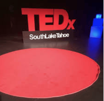empty red dot on stage at tedx