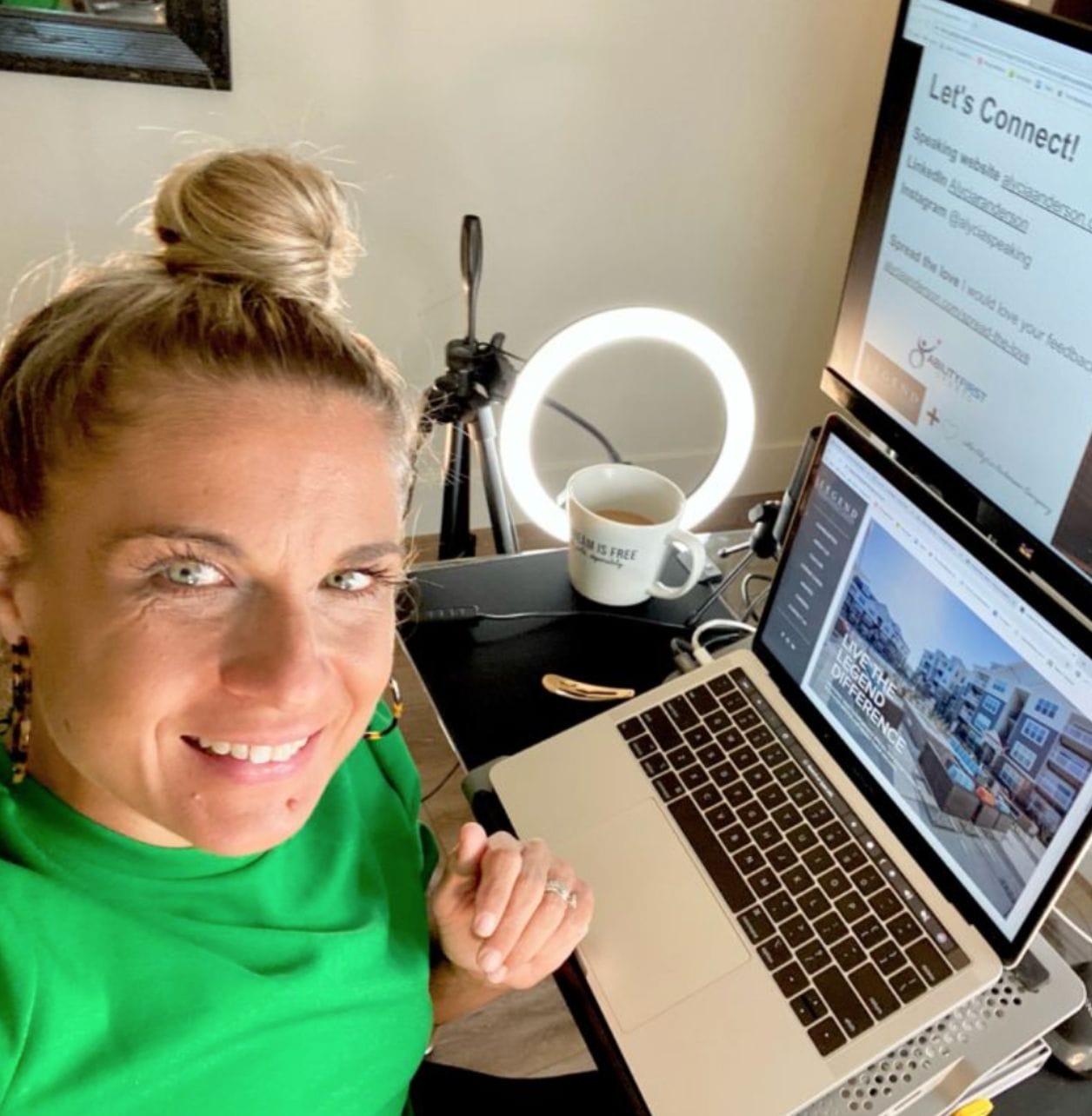 alycia at her desk preparing for a virtual speech with her coffee