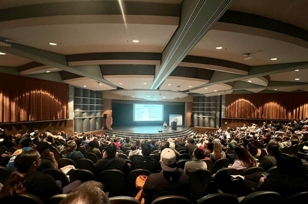 Alycia on stage in front of crowd