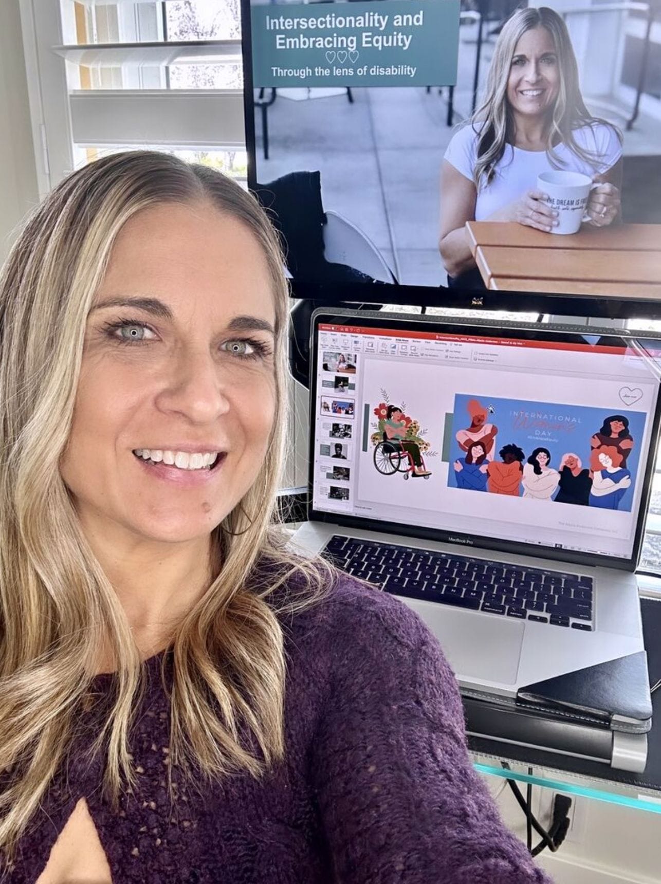 ID: Alycia sitting in studio wearing purple giving speech "Intersectionality and Embracing Equity Through the Lens of Disability"