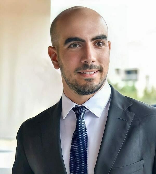 joze piranian in suit and tie