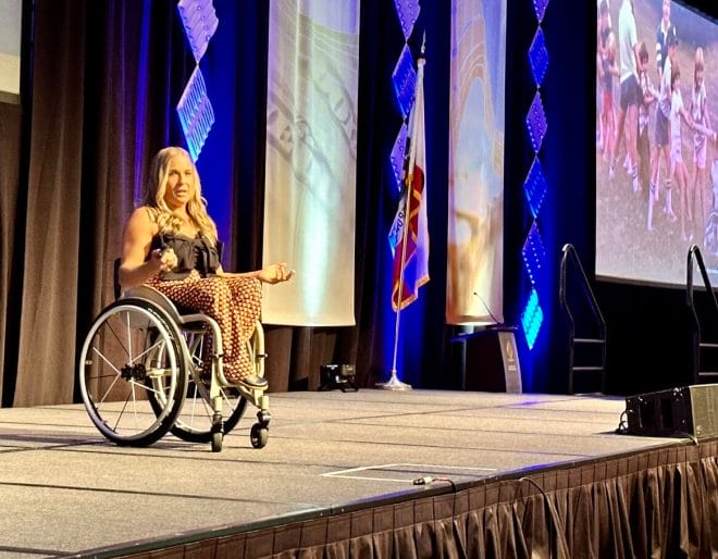 alycia on stage at rcoe conference