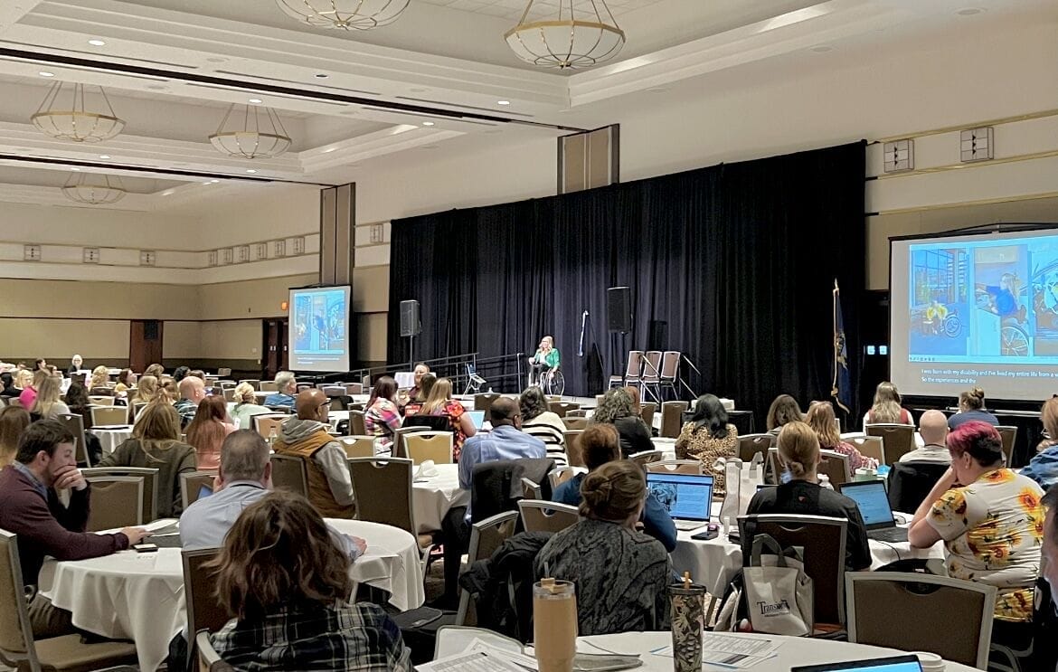 picture of alycia on stage with the crowd in front of her