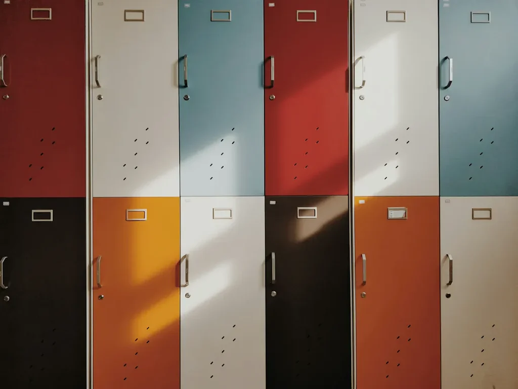 multi coloured lockers in a school hallway