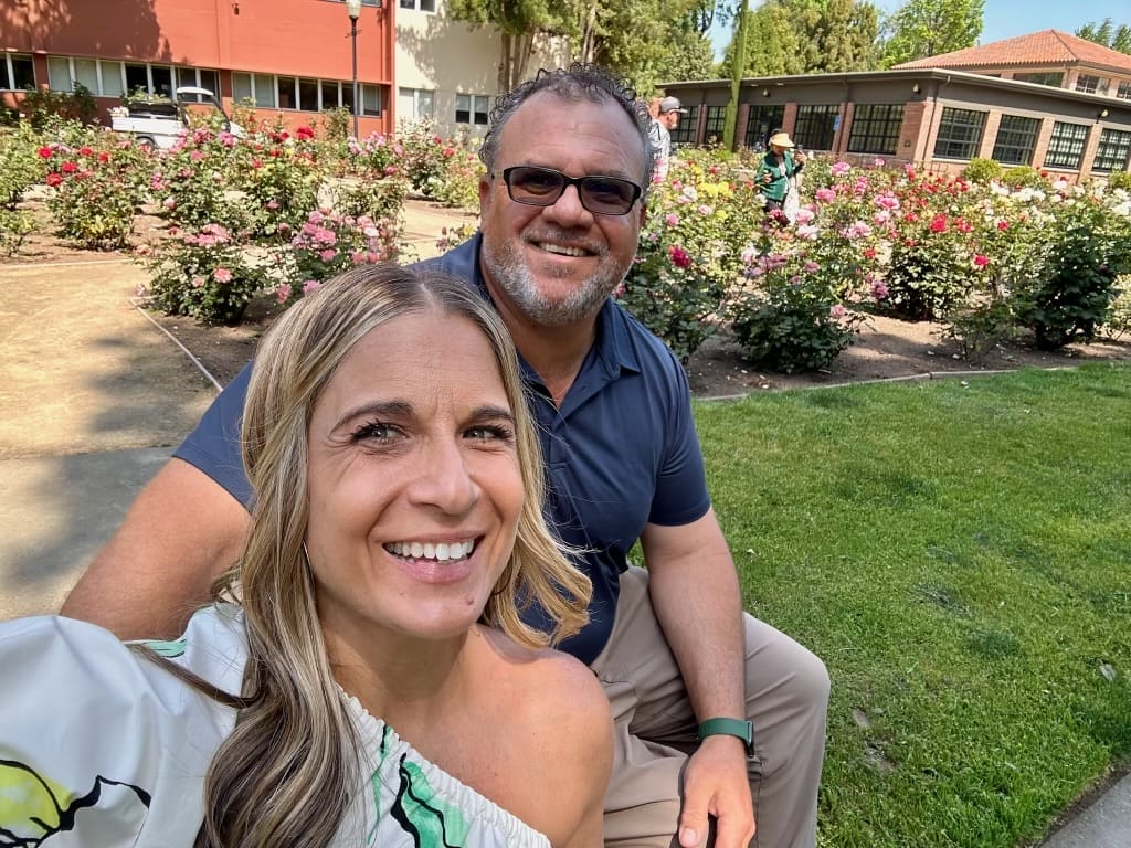 alycia and marty in chicos rose garden