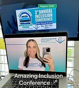 alycia keynote speaker at the third annual inclusion conference hosted by supporting inclusive practices picture of alycia on a dual monitor setup with conference logo on one screen and alycia holding her phone taking a picture on the other after her key presentation