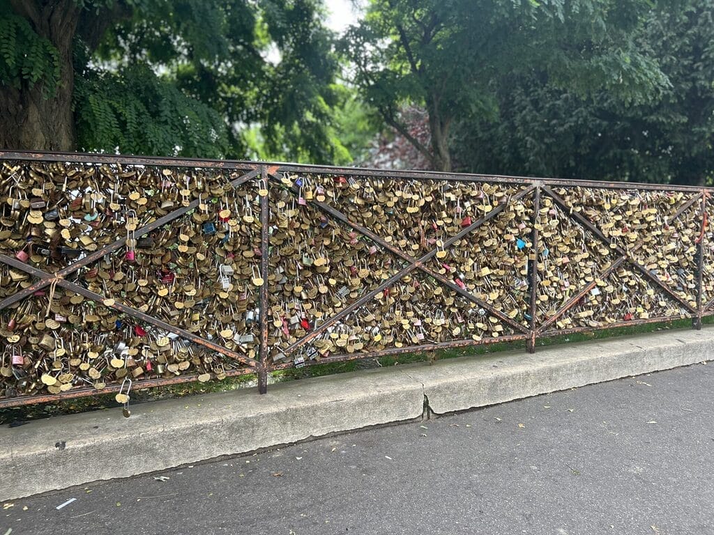locks of love on a fence on montmartre paris