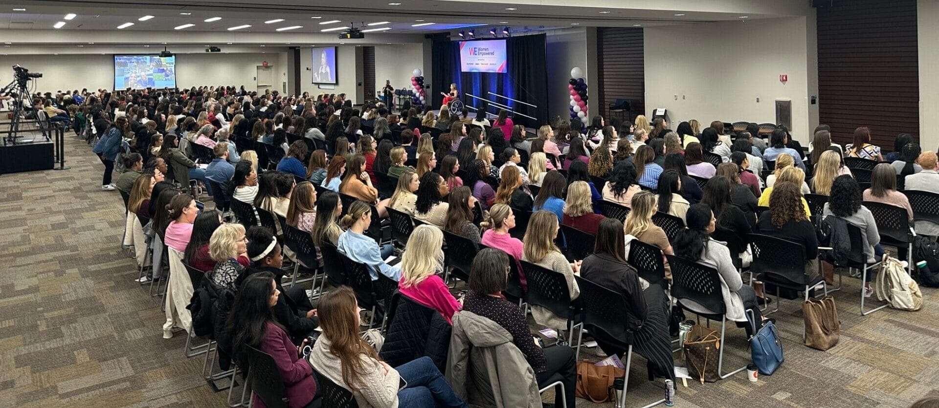 large audience watching alycias keynote