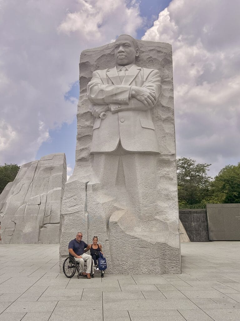 marty and alycia sitting in front of the mlk statue memorial