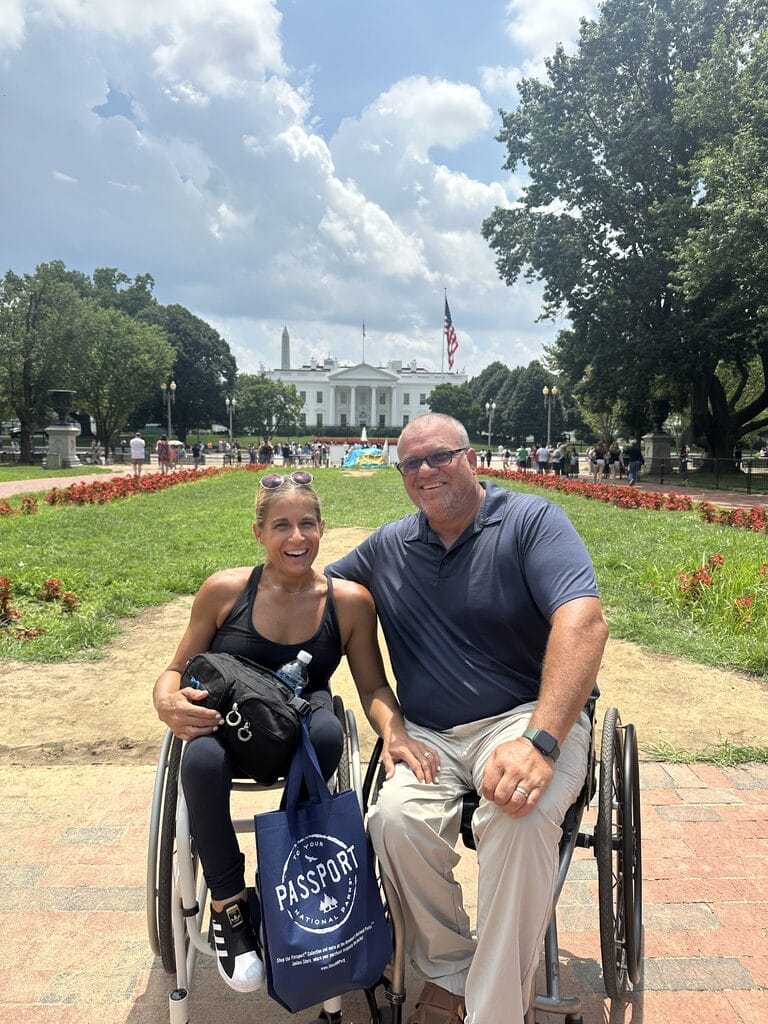 marty and alycia sitting in front of the white house