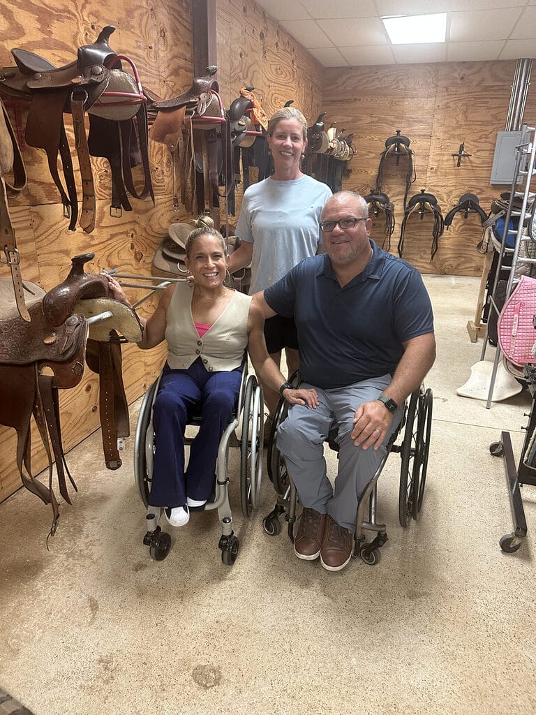 marty alycia and carline in the equipment room together at the great program equestrian center