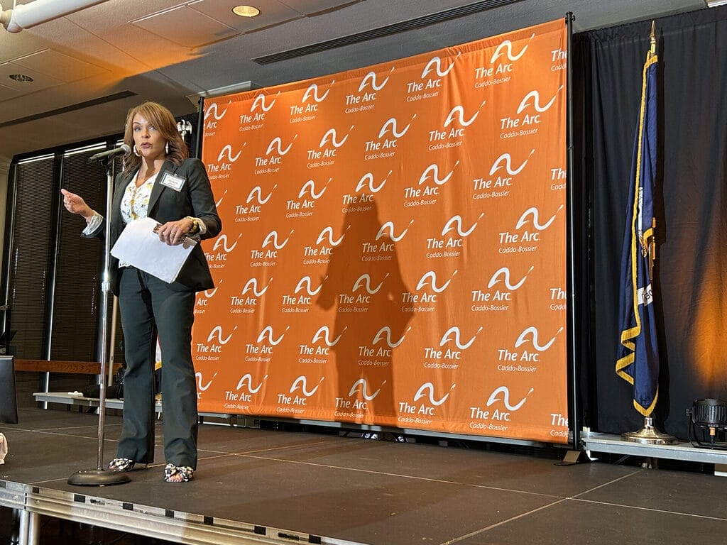 jacque jovic emmy award winning news anchor of k t a l n b c local channel six addresses the audience