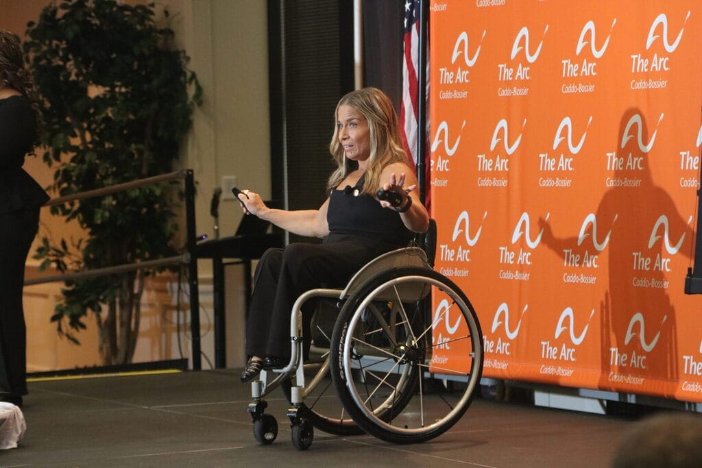 alycia on stage giving her speech