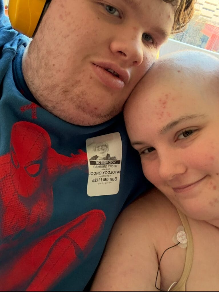 isabella izzy grimmer snuggling with her brother eli